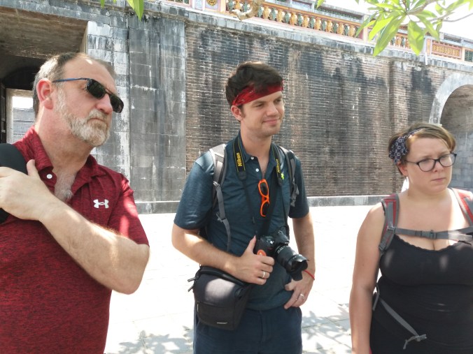 Hue, listening to our guide in citadel